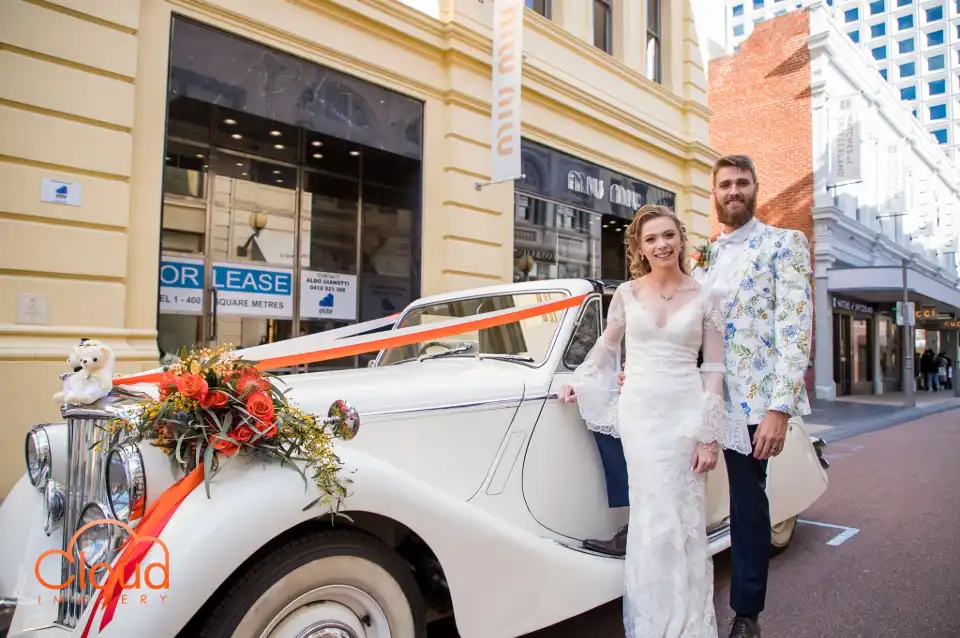 Cloud Imagery - Bride and groom in front of Jaguar Mk 5 Sedan in King Street Perth