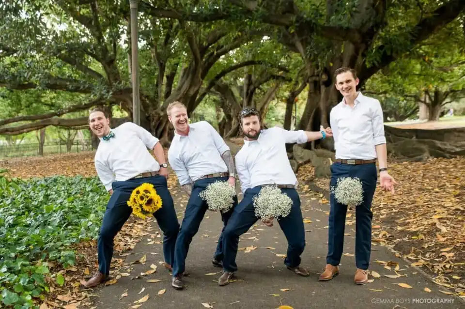 Fox and Luna Photography - Groomsmen posing with flowers