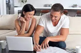 A couple discussing their wedding budget